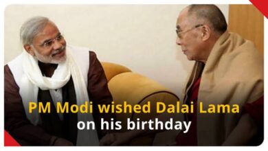 PM Modi wishing the Dalai Lama